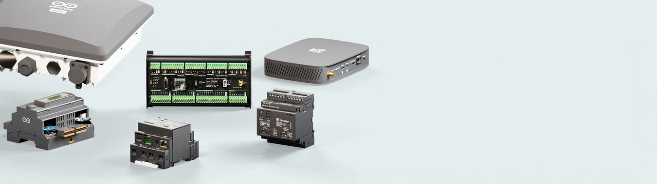 Front view of industrial-grade turnkey solutions including gateway devices, I/O modules, and programmable controllers, arranged on a light background.