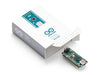 Arduino Nano module next to its official packaging, showing the contents of the box.